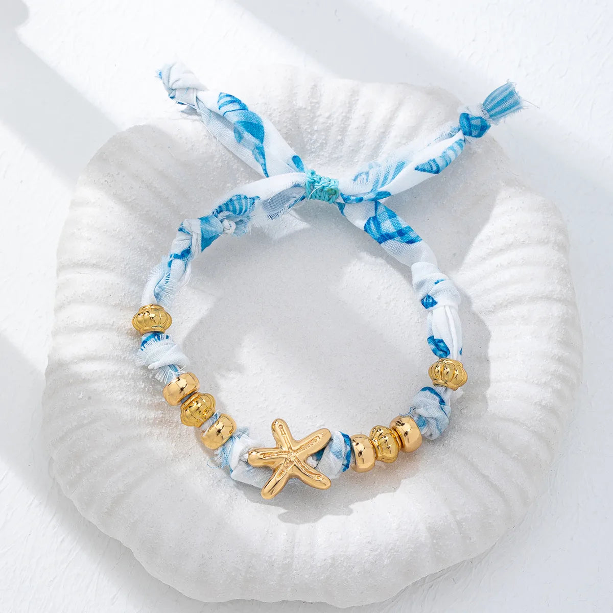 Bracelet À Cordon Motif Étoile De Mer En Métal Plaqué Or Avec Perlage Pour Un Style Élégant