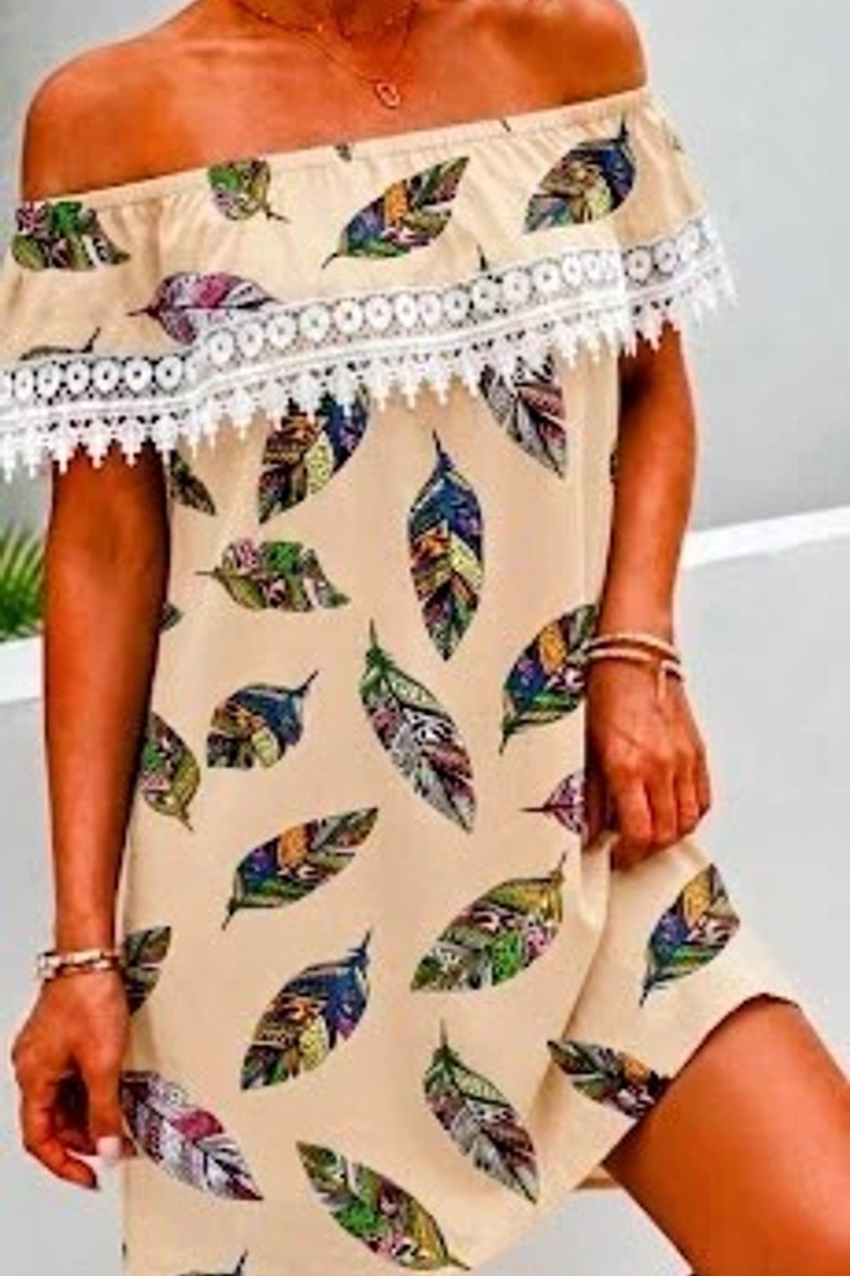 Robe mi-longue plumes