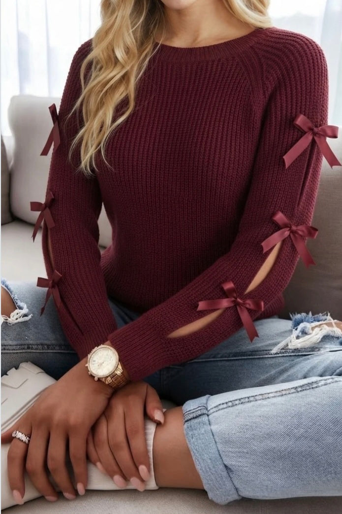 Pull à maille avec nœud
