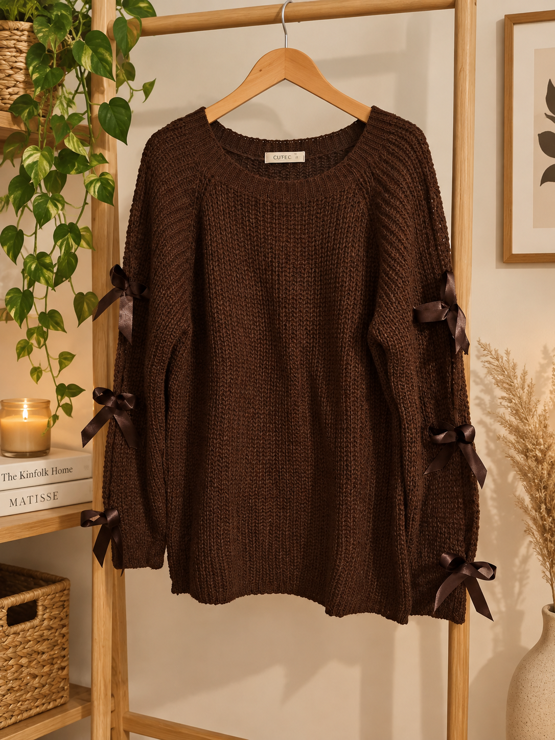Pull à maille avec nœud