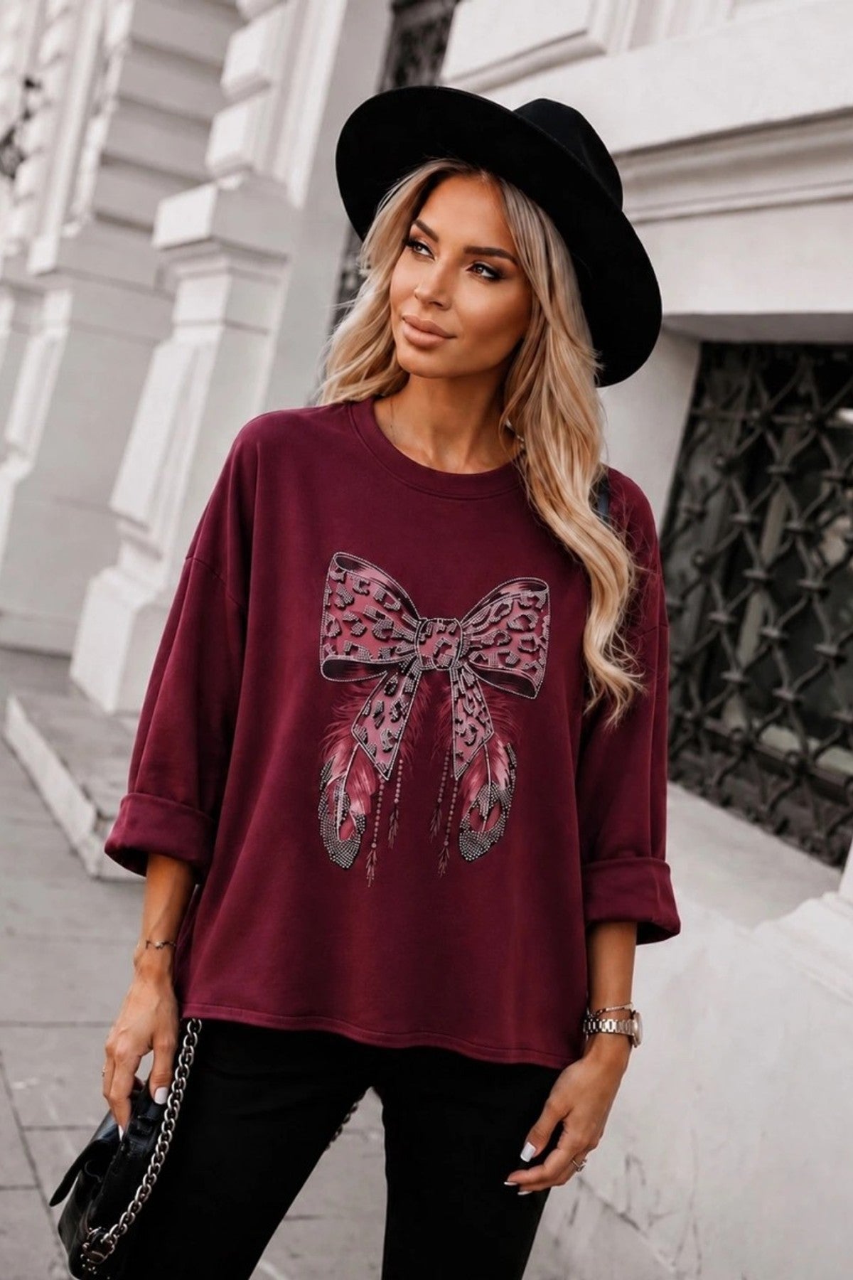 Pull oversize nœud léopard strass