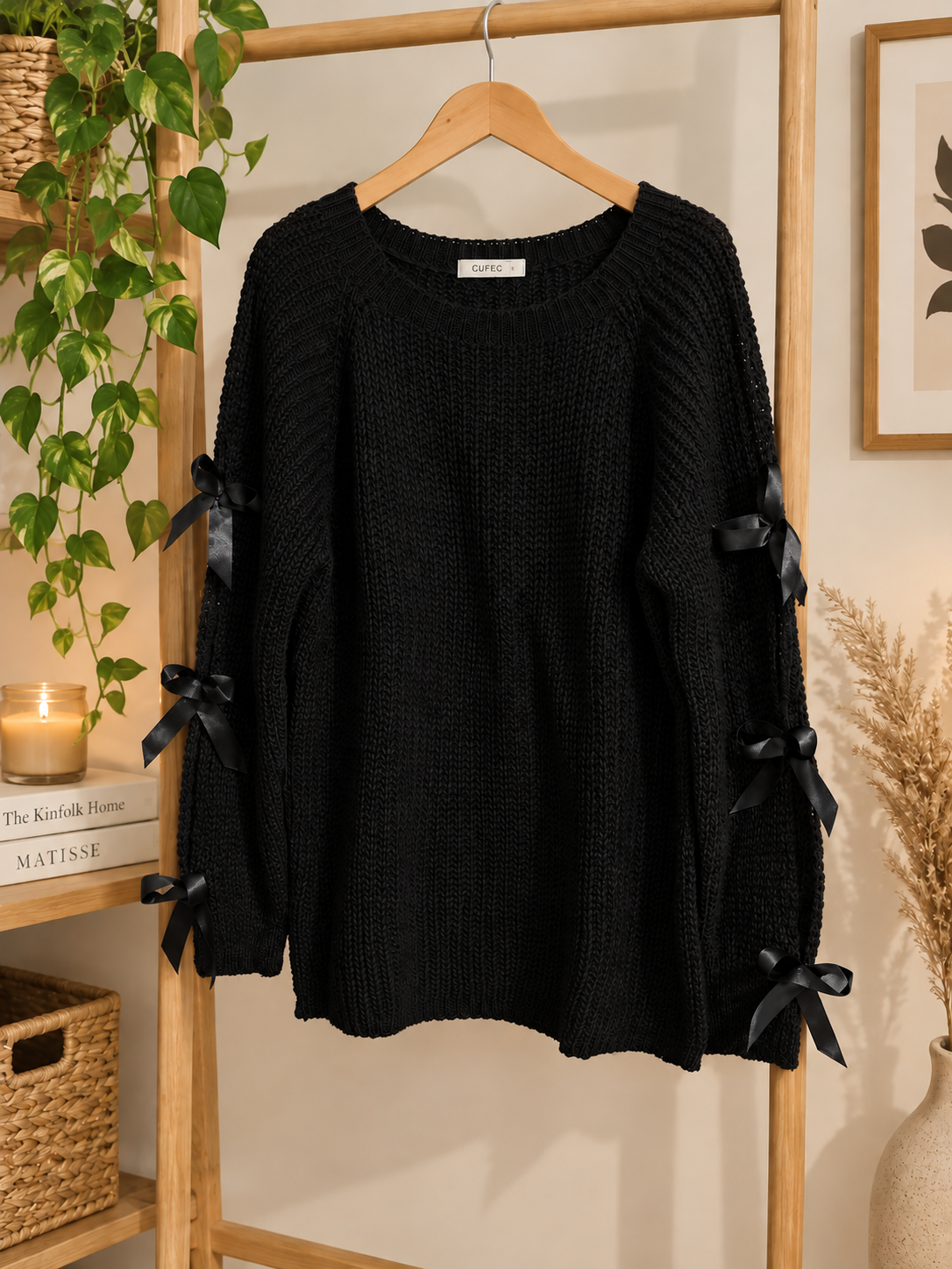 Pull à maille avec nœud