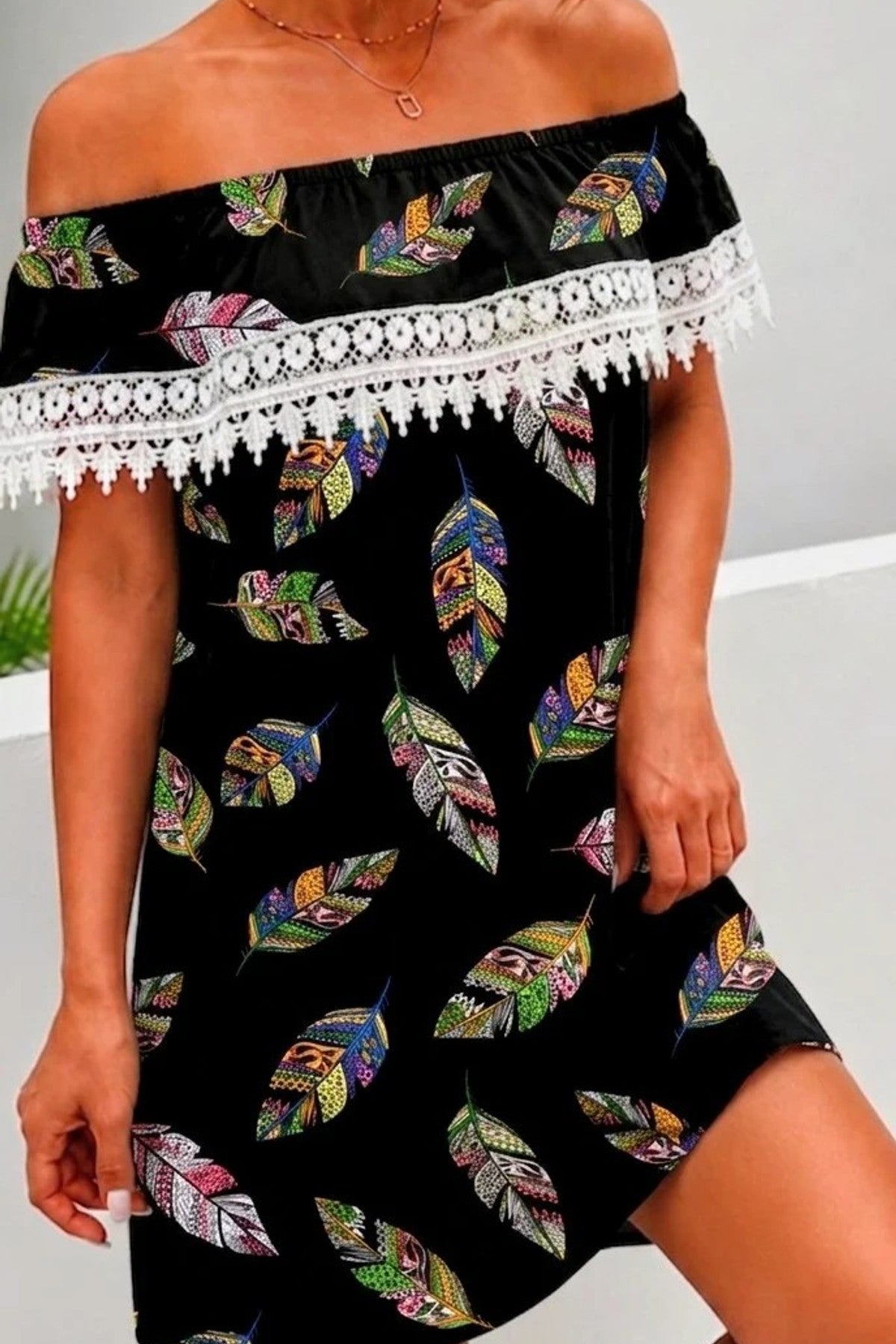 Robe mi-longue plumes