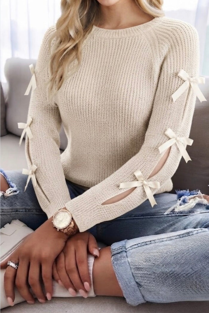 Pull à maille avec nœud